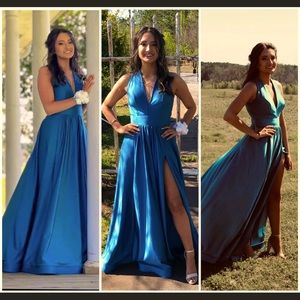 Blue dress with slit, down the leg and a low V-neck